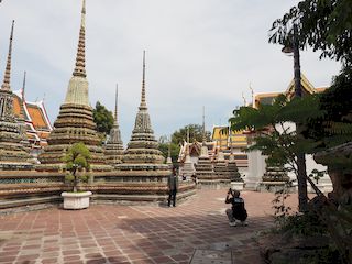 some stupas in the temple courtyard, Bangkok • Thailand