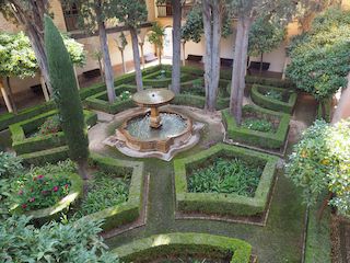 Garden in one of the courtyards of the Alhambra palace, Granada • Spain